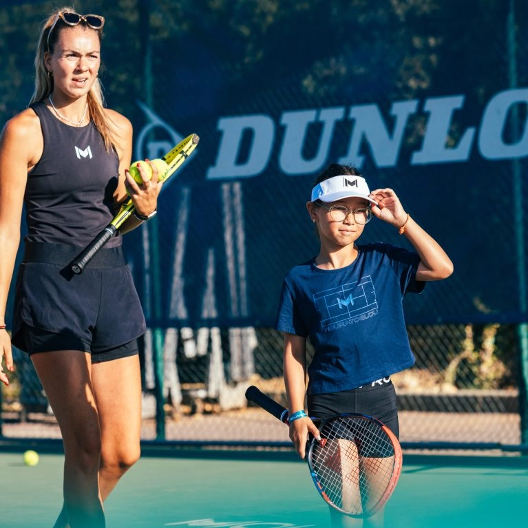 Coach et enfant Mouratoglou Academy