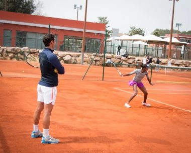 Placement fond de court Mouratoglou