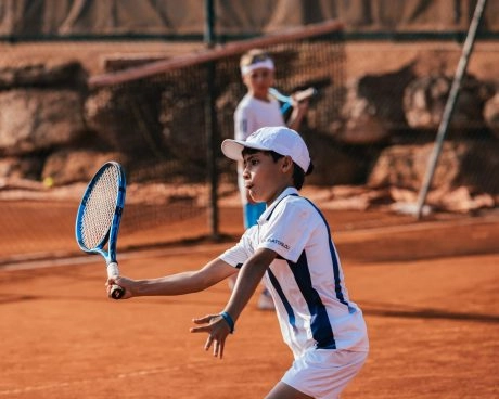 coach tennis junior